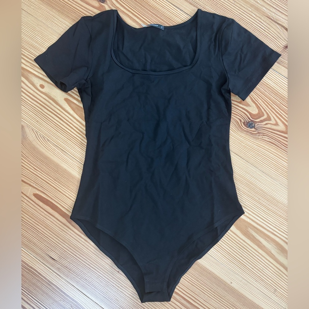 Brand new never worn with tags bodysuit women’s small